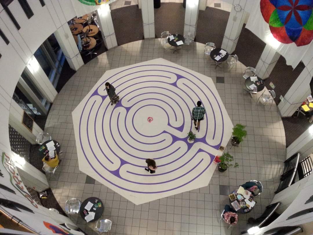 Students, faculty, and staff walk the Paths of Peace Labyrinth for 2015 World Labyrinth Day and in memory of students who died during that academic year.